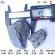 Calcium silicon Si58% Ca30% 10-50mm lump size test with ruler showing particle dimensions, typical irregular lump shape, with chemical composition specifications table below, angle 1