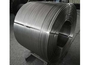 The finished core wire is ready for packaging, and the surface of the wire roll is shiny with metallic luster