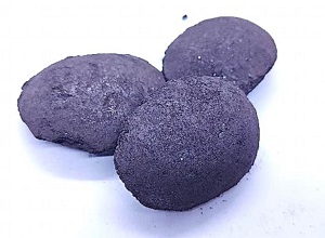 Silicon briquette 75% appearance showing typical pillow-shaped briquette,dark gray color,smooth surface texture