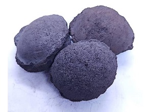 Silicon carbide briquette 70 appearance showing typical oblate spheroidal briquette, dark color, smooth surface texture - Bright Alloys