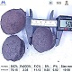 Silicon carbide briquette 70 diameter measurement with ruler showing width dimension, typical pillow-shaped briquette, with chemical composition specifications table below