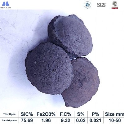 Silicon carbide briquette 75% appearance showing typical pillow-shaped briquette, dark gray color, smooth surface texture,with chemical composition specifications table below
