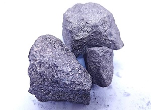 Silicon manganese 60/25 grade (SiMn 6025) lump appearance showing metallic luster, silver-gray color, typical irregular lump shape