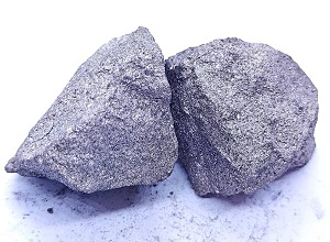 Silicon manganese 63/25 grade (SiMn 6325) lump appearance showing metallic luster, silver-gray color, typical irregular lump shape